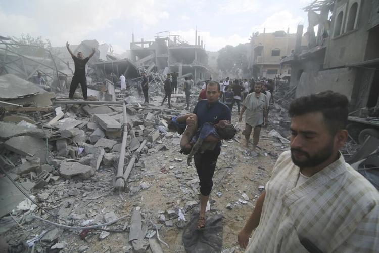 Israel bombs Gaza region where civilians were told to seek refuge, as mediators try to unlock aid