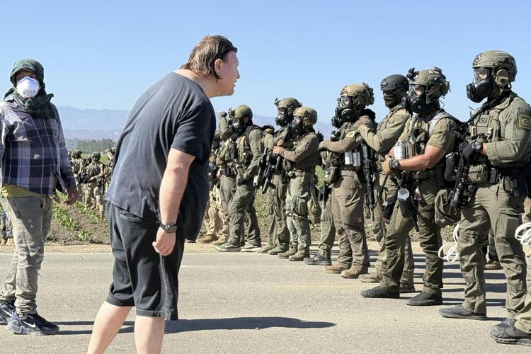 Protesters and federal agents clash during raid at Southern California farm