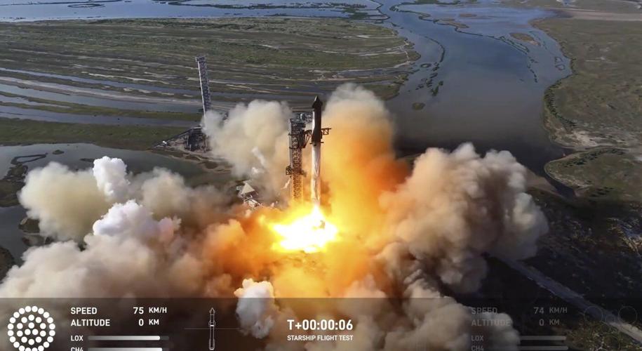 SpaceX launches giant Starship rocket, but aborts attempt to catch booster with mechanical arms
