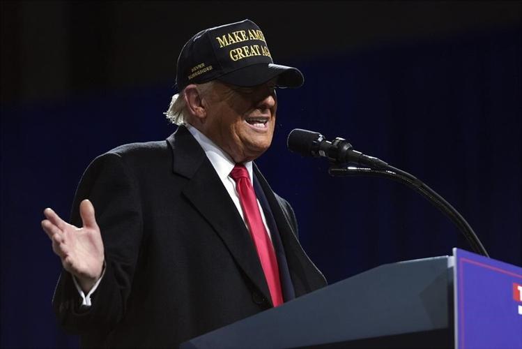 The Latest: The campaign for president enters its final push on the eve of Election Day