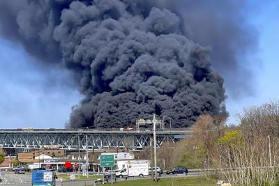 Driver charged with negligent homicide in fiery crash that shut down Connecticut highway bridge