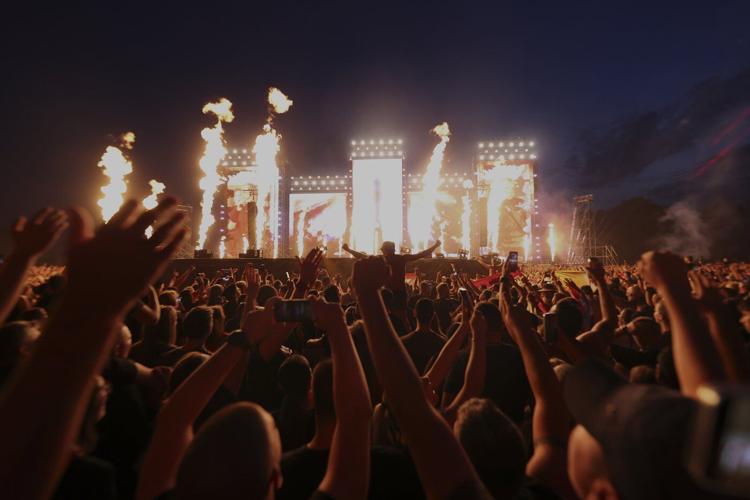 Croatian right-wing singer Marko Perkovic and fans perform pro-Nazi salute at massive concert