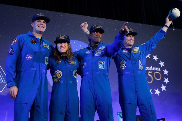 Artemis II's moon-traveling astronauts return home to cheers after a record-breaking trip