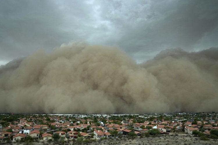 Towering wall of dust rolls through metro Phoenix, leaving tens of thousands without power