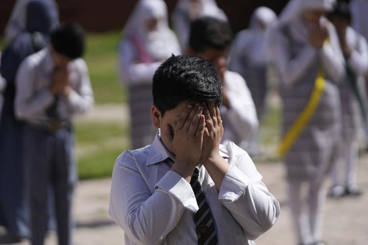 PHOTO COLLECTION: India Pakistan School Reopening