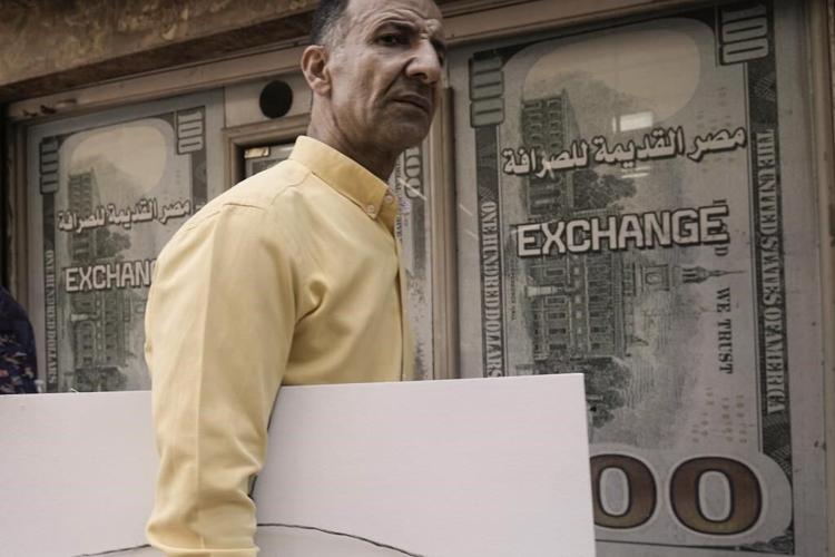 Egypt floats its currency, agrees with the IMF to increase bailout loan to $8 billion