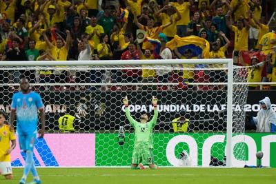 Daniel Muñoz scores and Colombia edges Congo 1-0 to reach the knockout stage at the World Cup