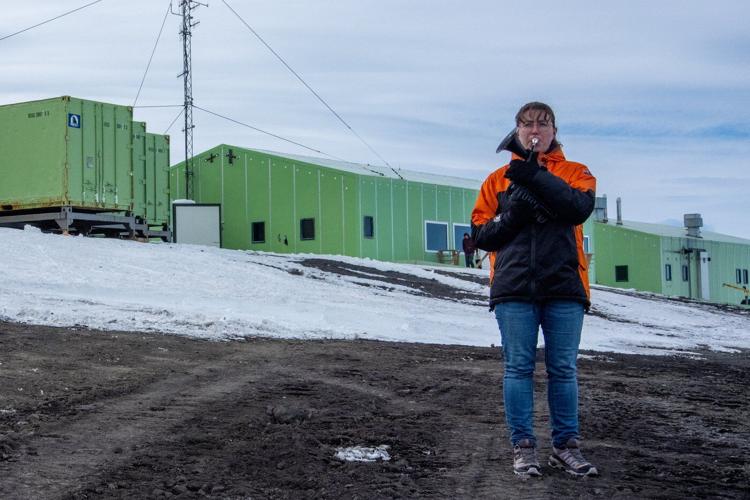 On the world’s coldest stage, a military musician plays with a plastic horn and double gloves