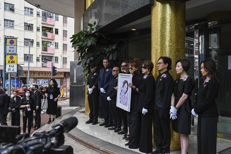 Singer Coco Lee mourned by fans and family at Hong Kong funeral