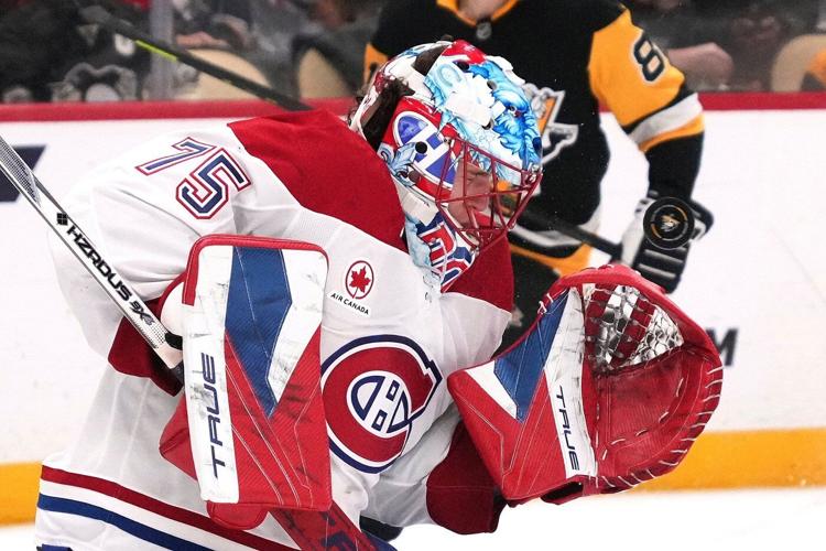 Crosby breaks Lemieux's scoring record, Penguins beat Canadiens 4-3 in shootout