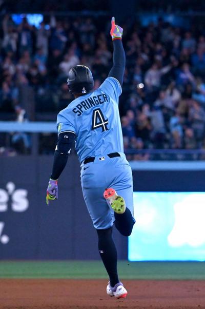 Springer hits two homers as Blue Jays top Athletics but lose Varsho to leg injury