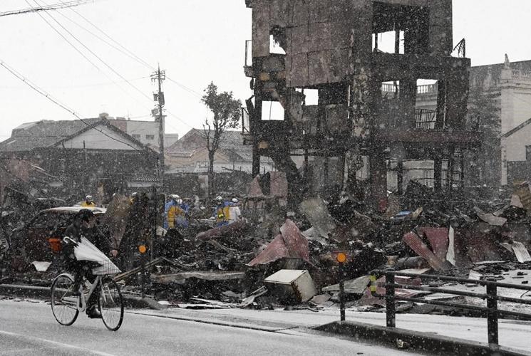 A woman in her 90s is rescued alive 5 days after Japan's deadly earthquake