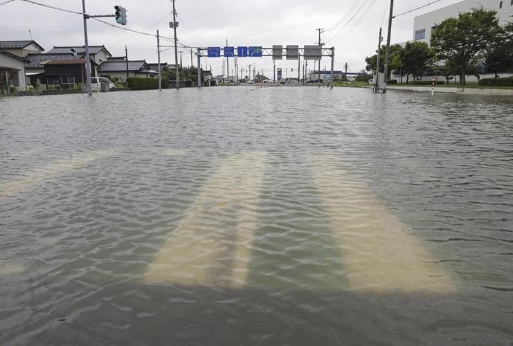 Heavy rain in northern Japan triggers floods and landslides, forcing hundreds to take shelter