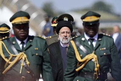 Iranian president arrives in Zimbabwe to anti-West songs for the last stop on a rare Africa trip