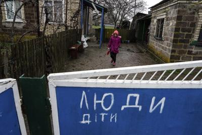 In Ukrainian village, a family lives under cloud of shelling