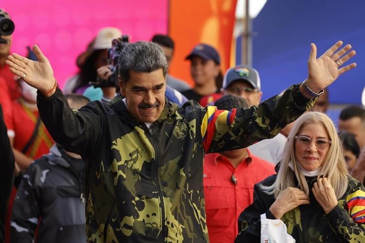 Dueling political factions demonstrate in Venezuela's capital as presidential election race heats up
