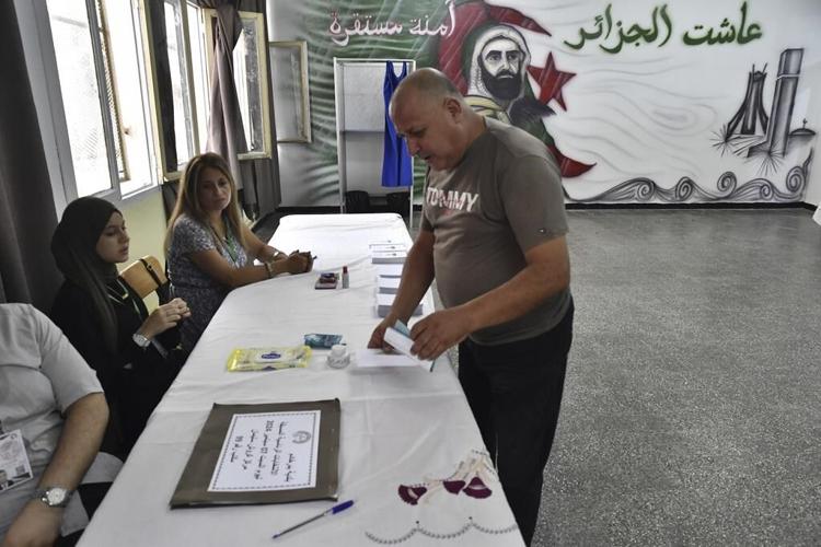 President Abdelmadjid Tebboune is re-elected in a landslide in gas-rich Algeria