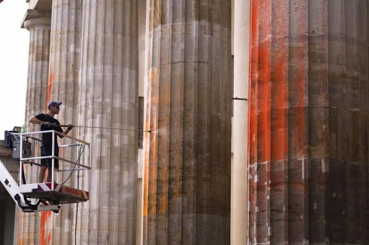 Cleanup of Berlin's Brandenburg Gate after climate protest to be longer and more expensive