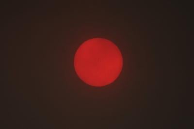 Red sun is result of wildfire smoke, not evidence of another planet