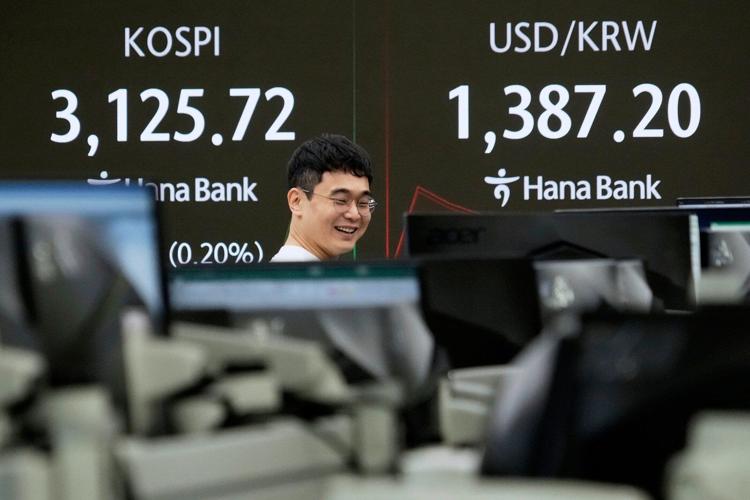 Asian markets are mixed after Wall St tumbles following poor US jobs report