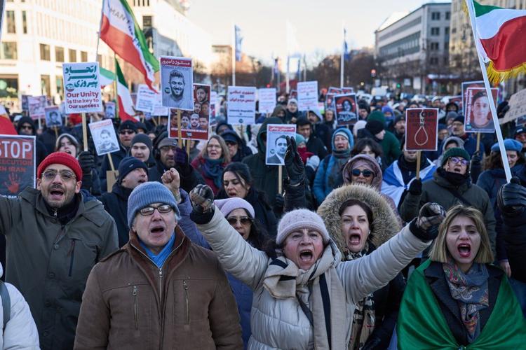 People rally around the world in support of protests in Iran, in photos