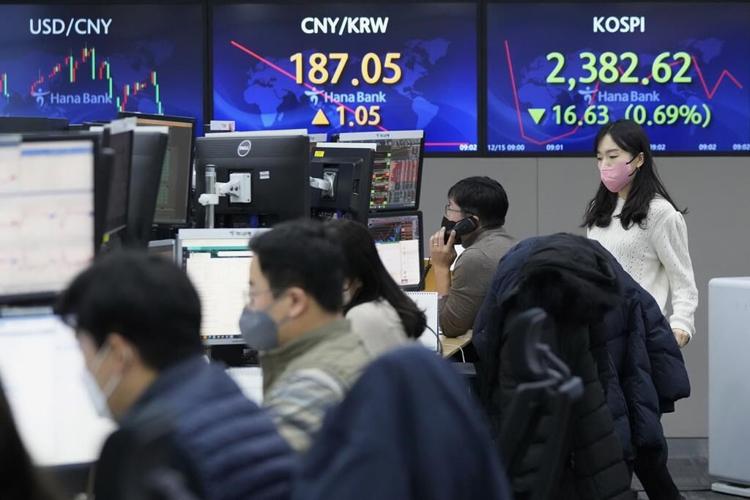 World shares decline after Fed warns of higher rates to come