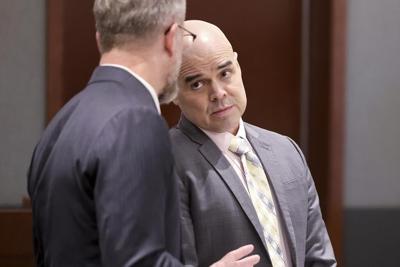Jury hears ex-politician on trial for murder amassed photos, ID records about slain Vegas reporter