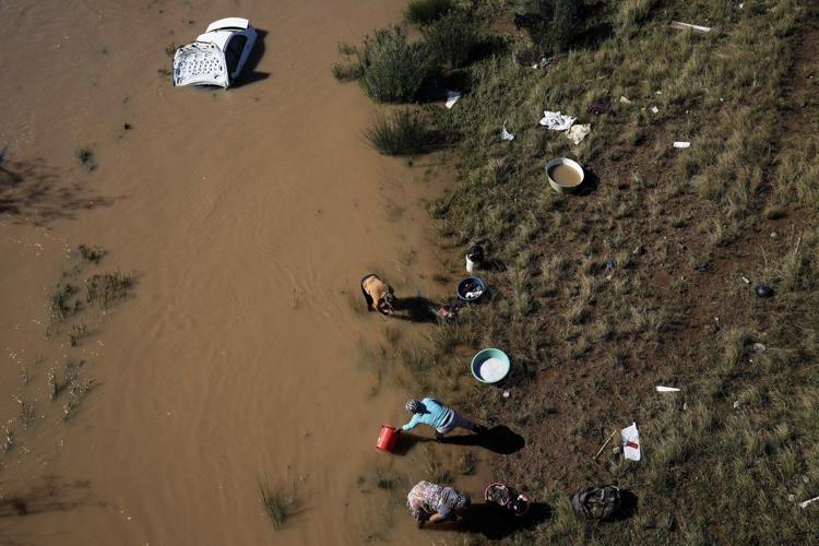 Catastrophic floods kill dozens in South Africa as photos show receding waters revealing more bodies