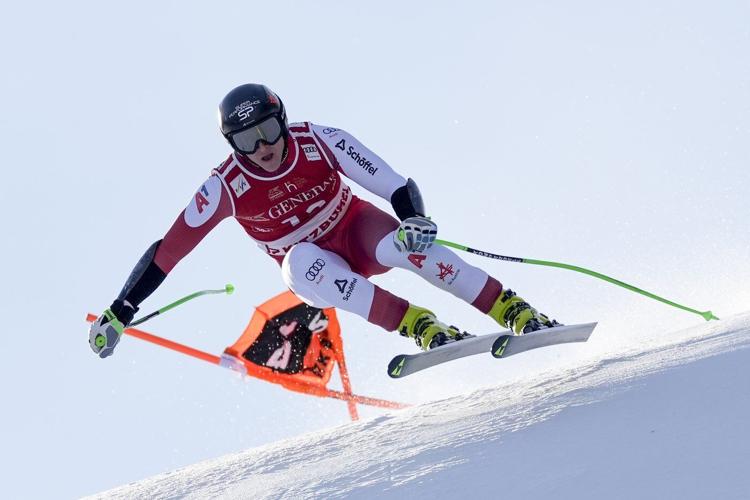 Swiss skier Marco Odermatt takes eventful World Cup super-G for 1st win in Kitzbuehel