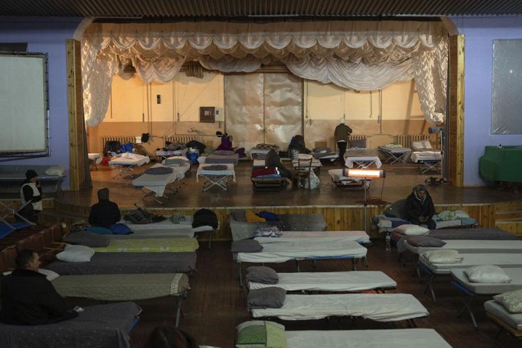 Russian forces edge closer to a key eastern Ukraine city in intense fighting, officials say