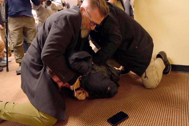 Man who squirted apple cider vinegar on Omar is charged with assaulting and intimidating her