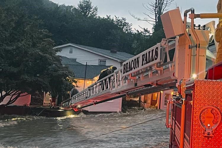 As much as 10 inches of rain floods parts of Connecticut. At least 1 person is dead