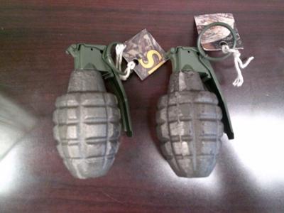 Inert grenades found in a bag cause evacuation at a Hawaii airport, man arrested