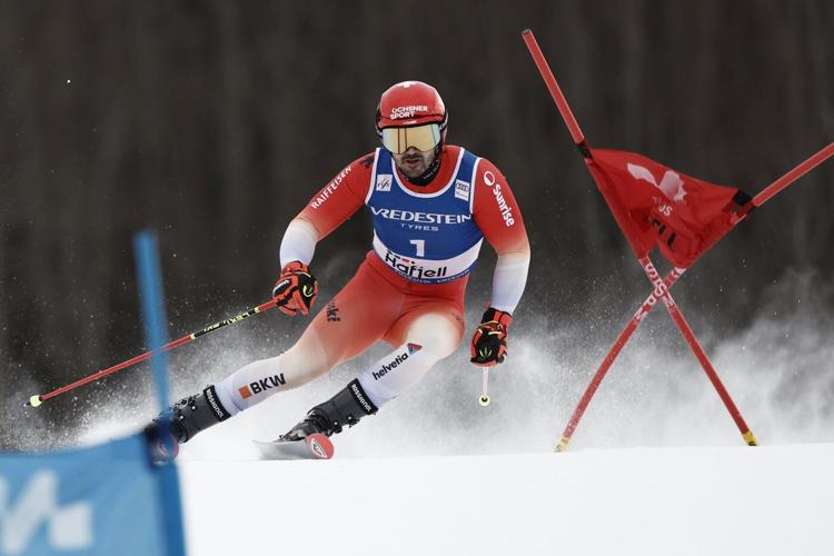 Swiss ski star Odermatt secures overall and GS World Cup titles in race won by teammate Meillard