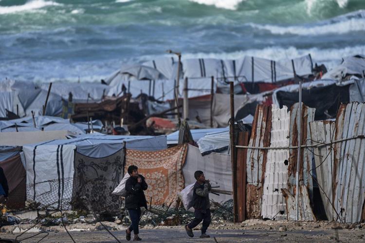 Winter rain floods Gaza camps as Netanyahu heads for US meeting