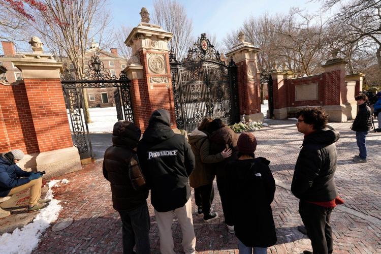 Search for the Brown University shooter continues as questions swirl about campus security