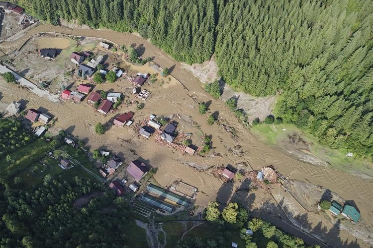 Flash floods in Romania kill at least 3 people and force hundreds of evacuations