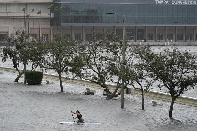 Hurricane Idalia hits Florida with 125 mph winds, flooding streets, snapping trees and cutting power