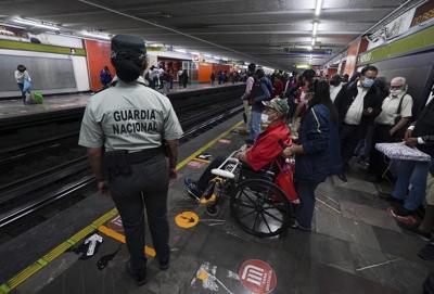Mexico City says subway crash caused by cut wires, speeding