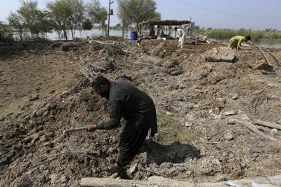 Pakistan's premier urges global aid for 20M flood victims