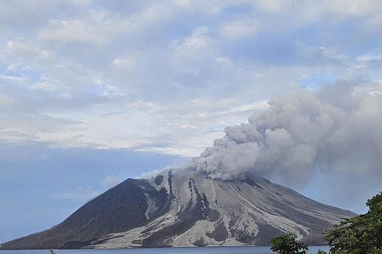 Indonesia's Mount Ruang erupts again, spewing ash and peppering villages with debris