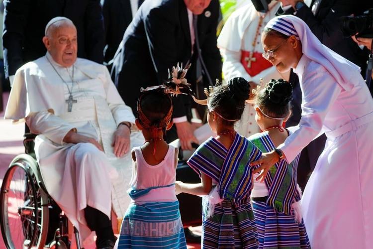 East Timorese flock to seaside park for Pope Francis' Mass at site of John Paul II's historic visit