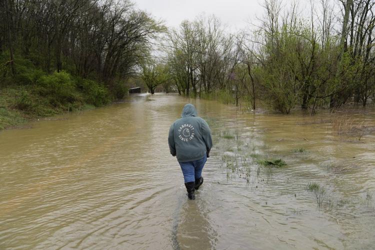 Swollen rivers flood towns in US South after dayslong deluge of rain