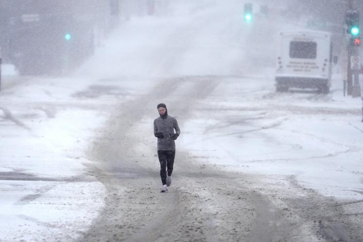 The Latest: Snow, ice and frigid temperatures make for a dangerous winter mix