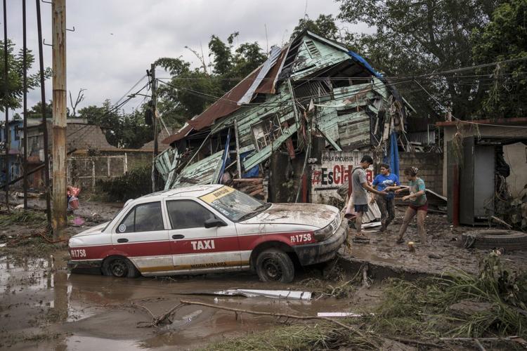 Heavy rain in Mexico sets off floods and landslides, killing at least 37