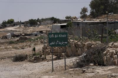 A settler accused of killing a Palestinian activist is to be freed. Israel still holds the body