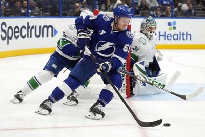 Kucherov gets 4th goal of the season, Lightning beat Canucks 4-1 in Milton-delayed home opener