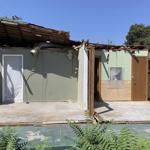 Half a house for half a million dollars: Home crushed by tree hits market near Los Angeles