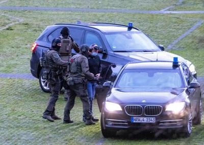 A German who served time for a high-profile kidnapping is convicted over armed robberies