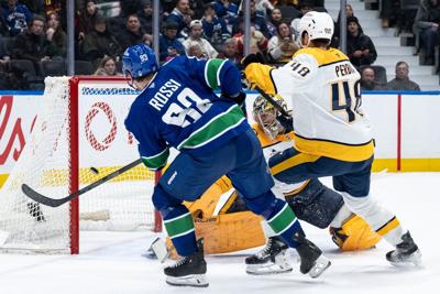 DeBrusk's shootout goal gives Vancouver Canucks 4-3 victory over Nashville Predators